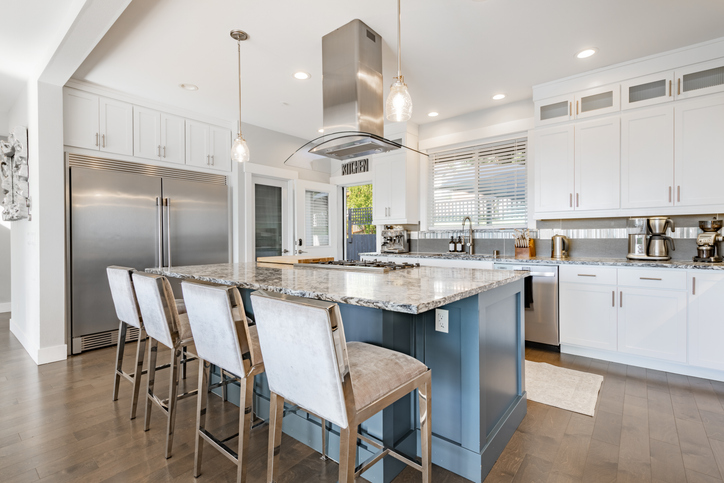 Modern kitchen with blue island