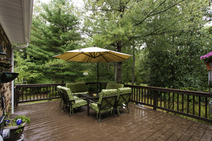 Rainy deck that likely doesn't need a deck replacement.